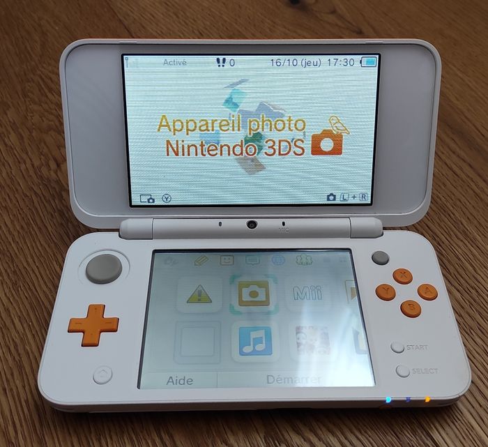 New Nintendo 2DS XL Blanc + Orange - photo numéro 2