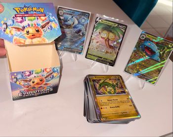 Lot 100 cartes Pokémon (20holographiques et reverse )+ boîte  évolution prismatique – sans doubles