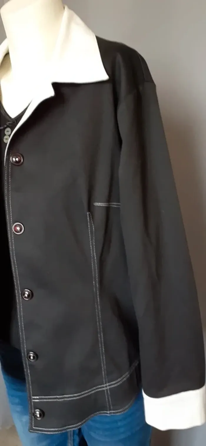 Jolie veste noire et blanche. - photo numéro 3