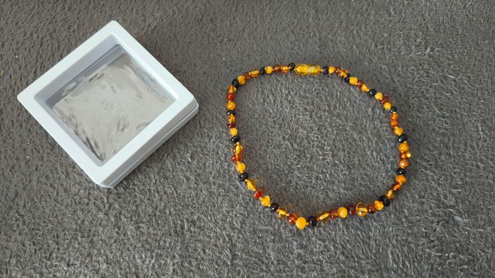 Collier ambre bébé - photo numéro 3