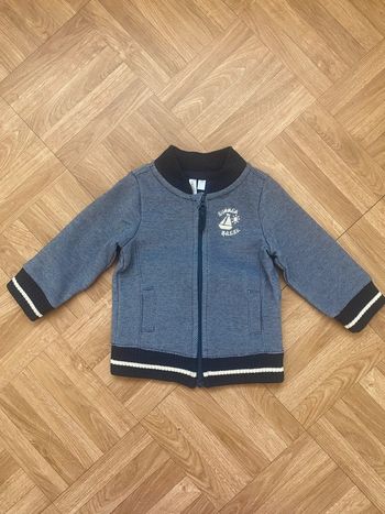 Veste avec zip bleu marine taille 6 mois Orchestra