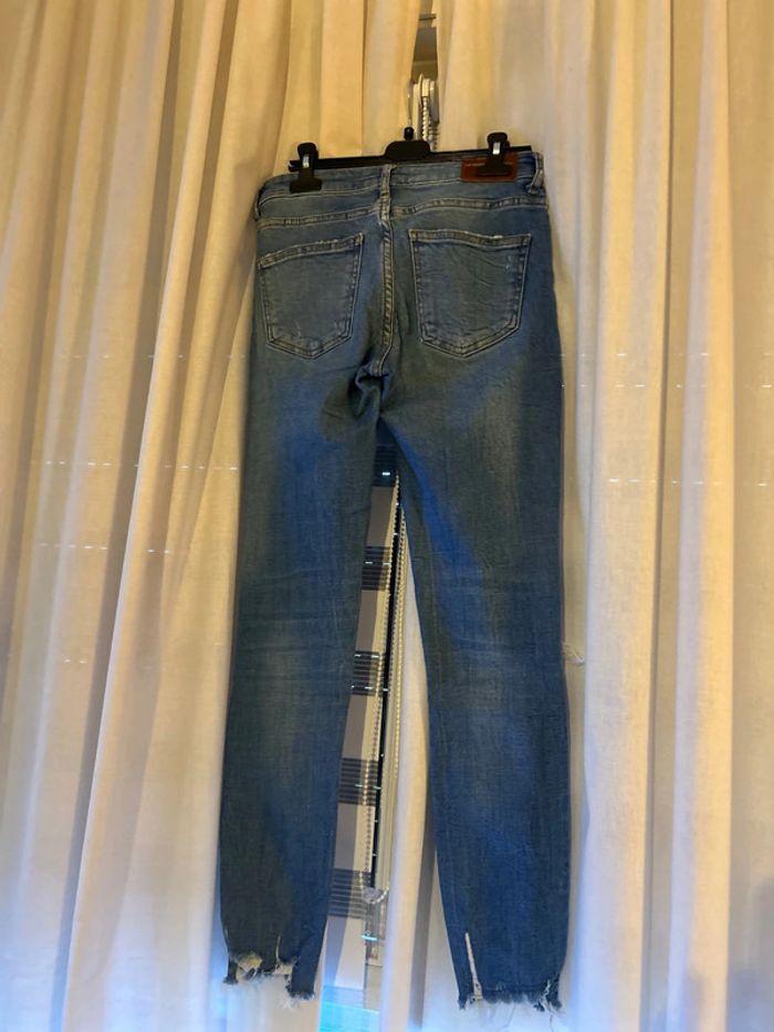 Jeans trouée - photo numéro 4