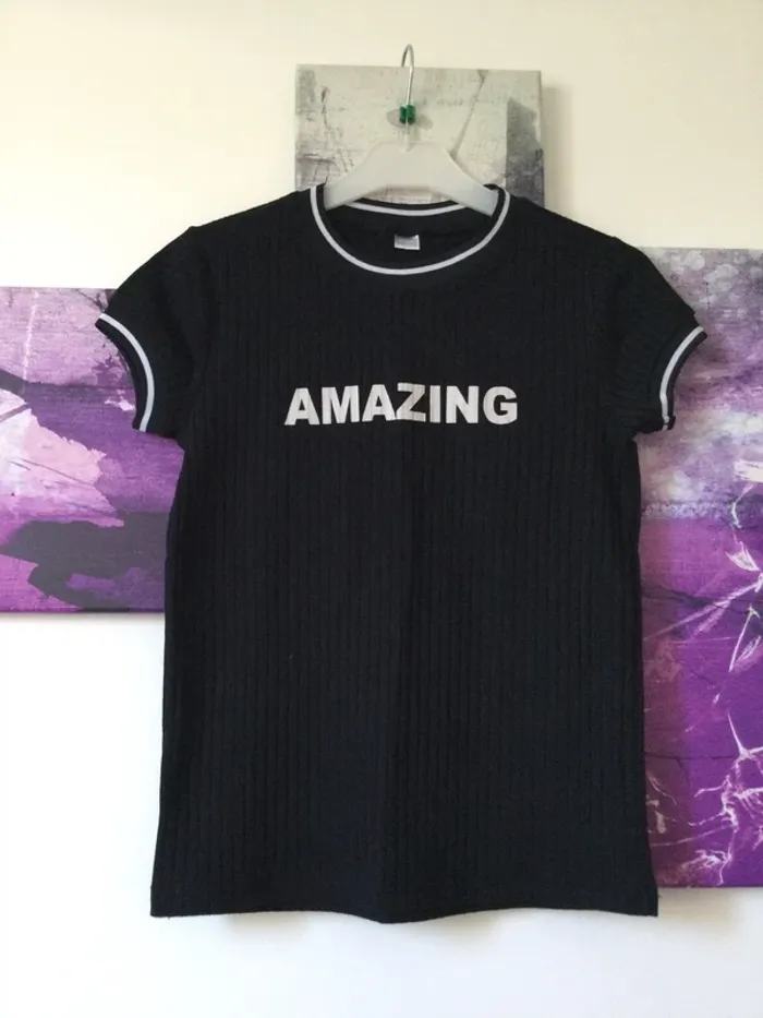 Polo noir 11-12 ans