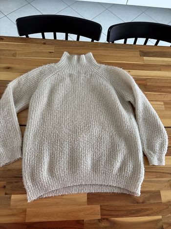Pull doré brillant