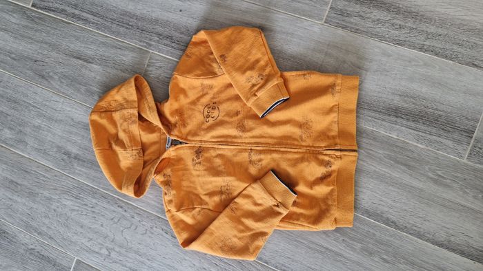 Gilets léger orange, motifs safari, taille 5 ans.