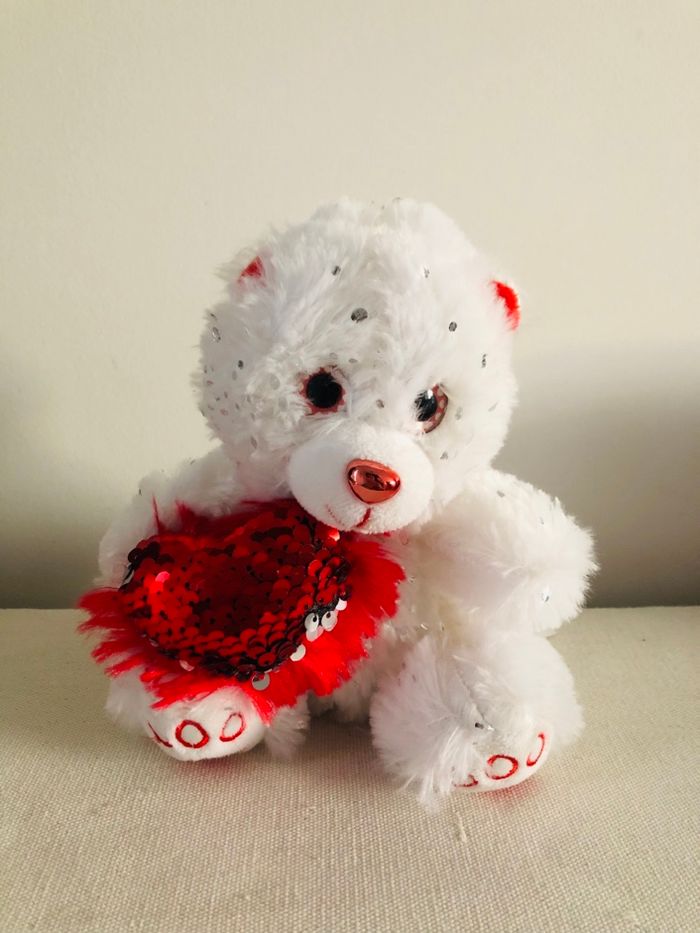 Peluche ours avec coeur sequin réversible