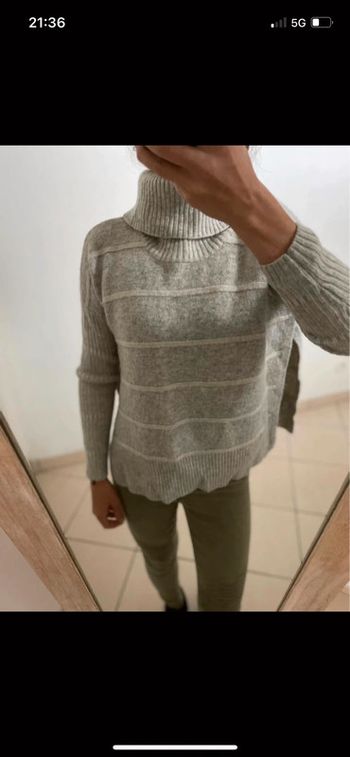 Pull ouvert sur les côtes