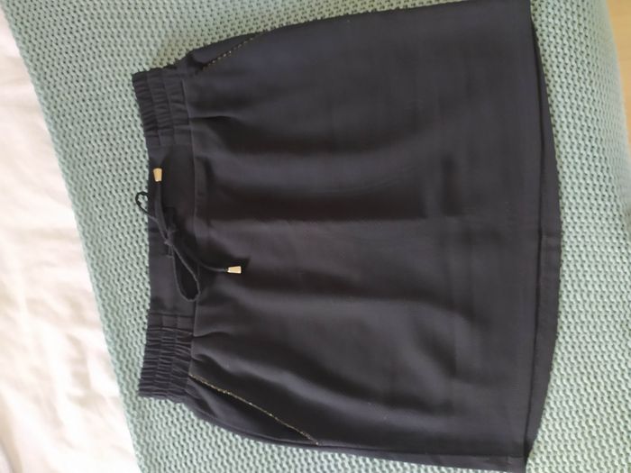 Jupe forme tennis avec poche et lien doré - photo numéro 4