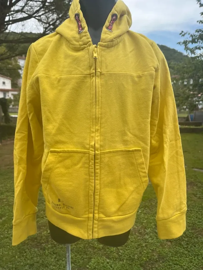 Gilet zippé jaune tape à l’œil taille 8 ans