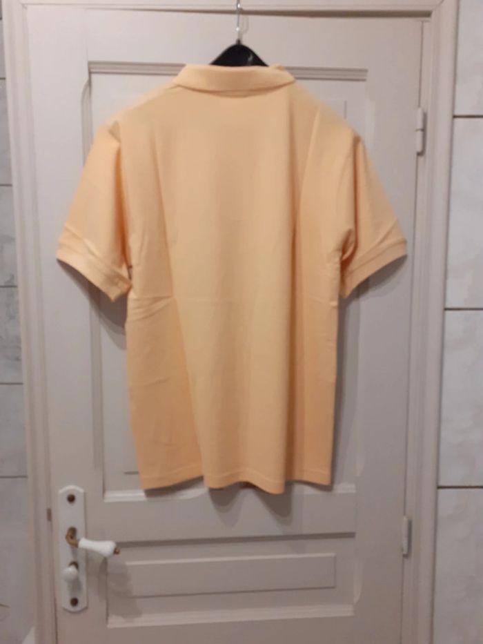 Polo  taille 4 neuf - photo numéro 4