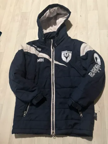 Manteau doudoune eldera 10/12 ans bleu marine et blanc très bon état