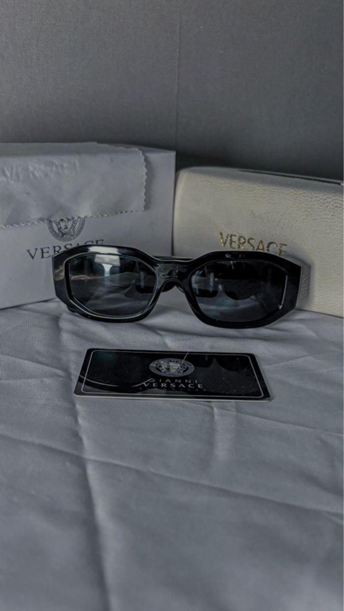 Lunettes de soleil noir - photo numéro 3