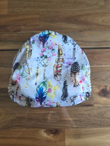 Couche plumes et clés 