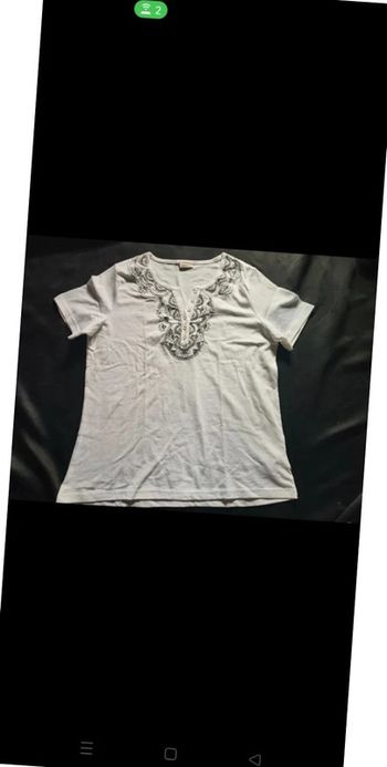 Jolie haut Damart 40/42