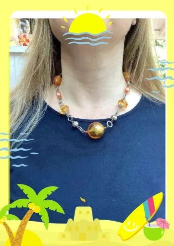 Collier orangé argenté avec boules