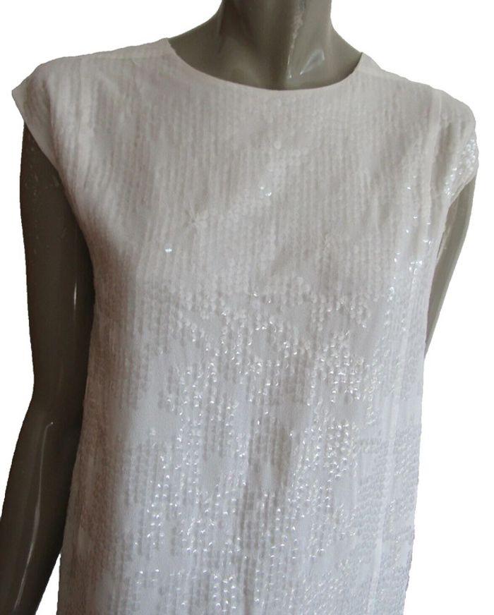 robe courte a paillettes transparentes sur fond crème marque les petites taille indiquée S = 36/38 - photo numéro 2