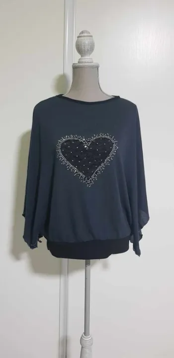 Pull manches ouvertes