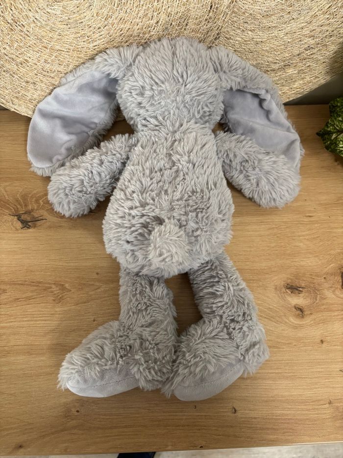 Doudou lapin grandes oreilles gris action