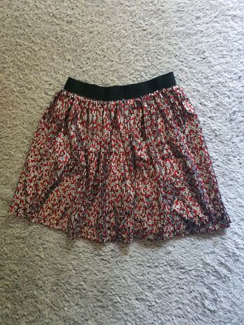 Jupe élastique et sequins taille 10 ans.