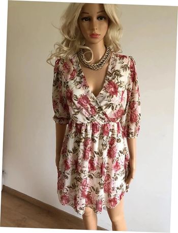 Robe imprimée fleurie à manches 3/4 taille unique jamais portée