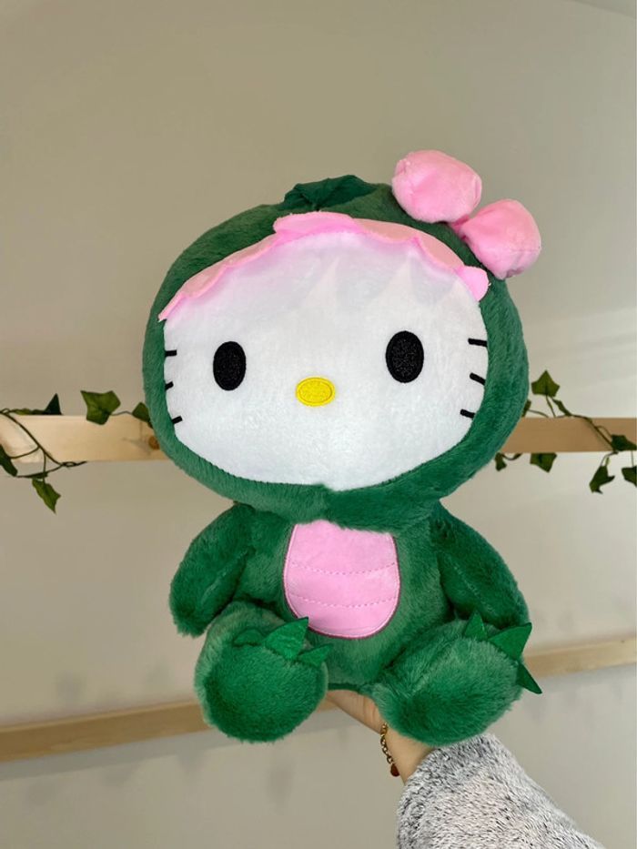 Peluche Sanrio Hello Kitty dinosaure