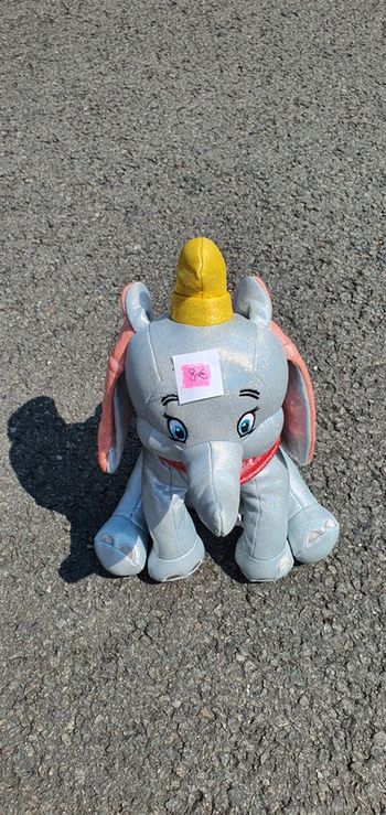 Peluche dumbo Disney 100 scintillante et musicale en très bon état