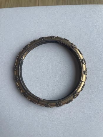 Jonc élastique dorée avec motifs fleurs