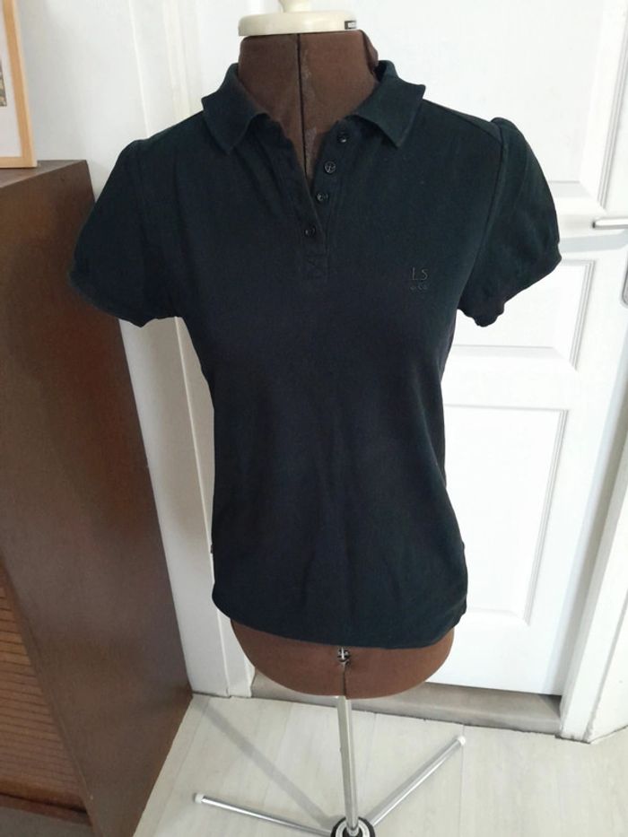 Très beau polo femme levi's vintage taille M