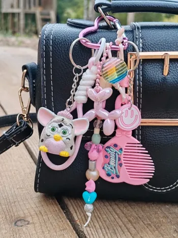 Bijou de sac gri-gri Furby rose et blanc