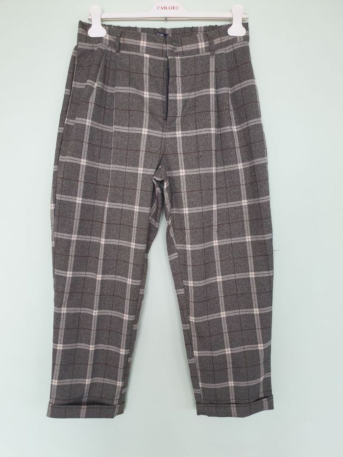 Pantalon à carreaux gris et blanc