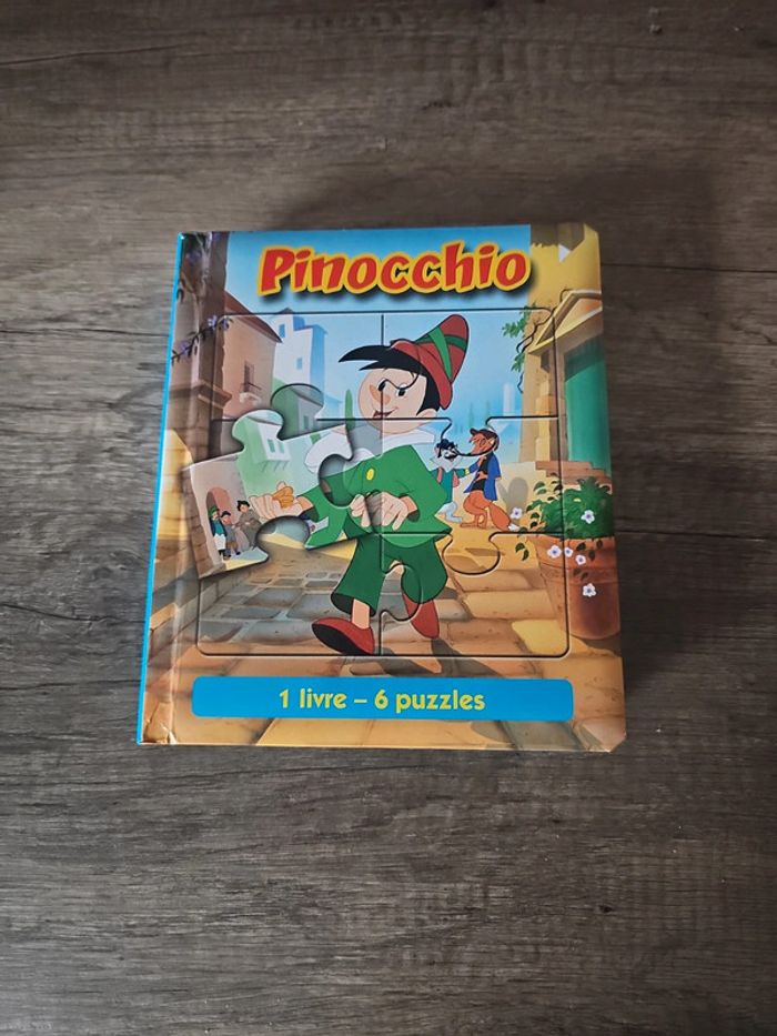 Livre puzzle pinocchio - photo numéro 1