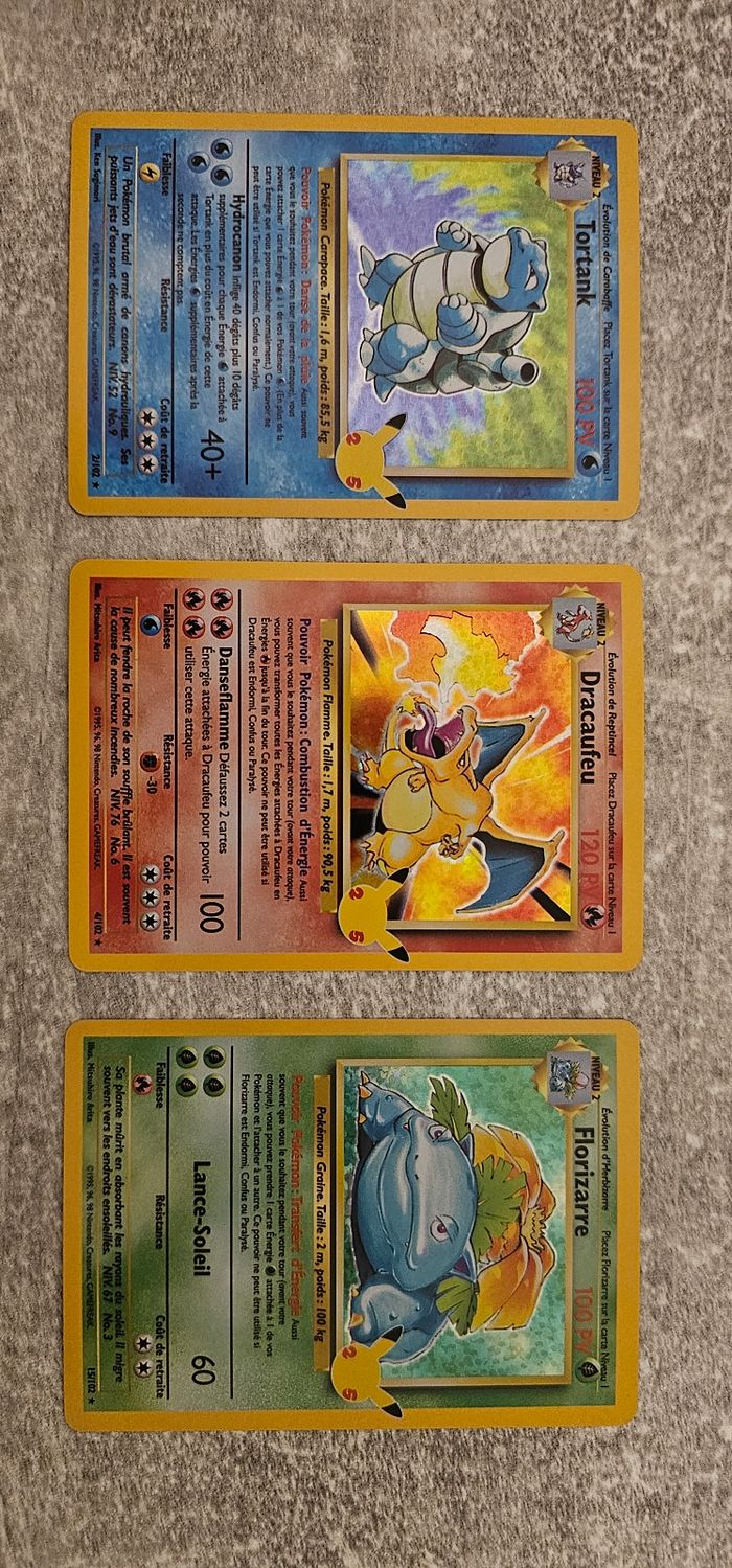 Carte Pokémon Dracaufeu ,Tortank et Florizarre 25ème anniversaire