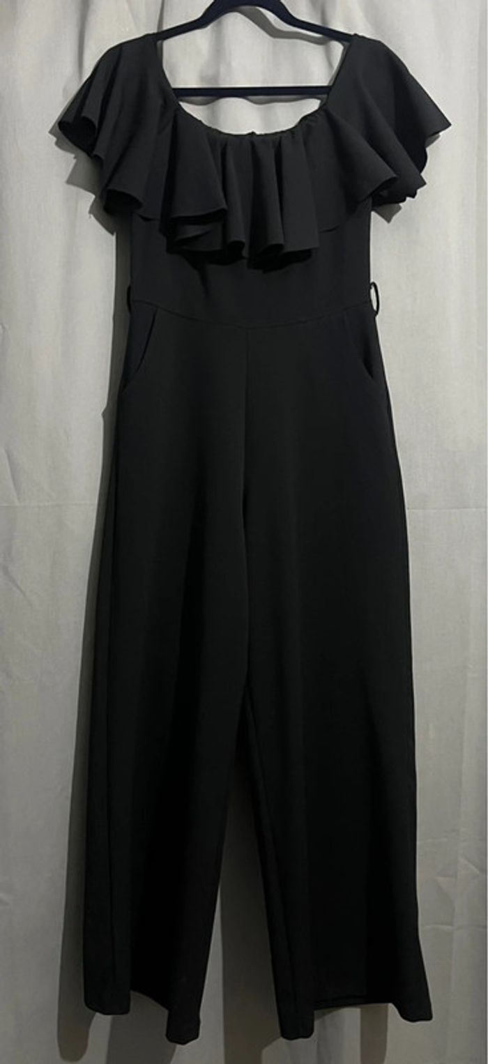 Combinaison femme noire taille unique comme neuve juste lavé
