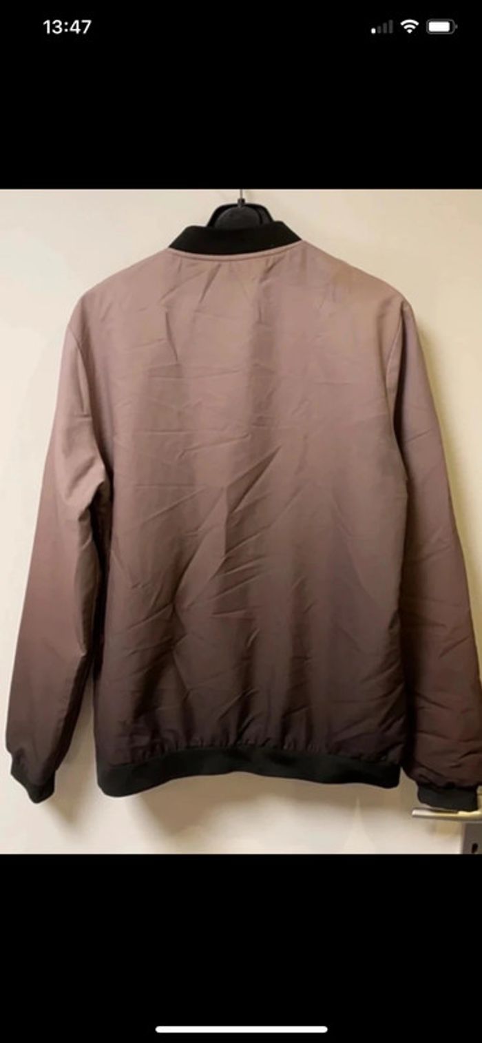 Blouson avec dégradé de couleur taille L plus d’étiquette quelques traces sinon très bon état - photo numéro 2