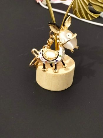 Porte clé bijou de sac petit ane avec pierres et strass neuf