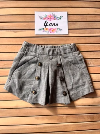 Jupe grise à bouton kiabi 4 ans