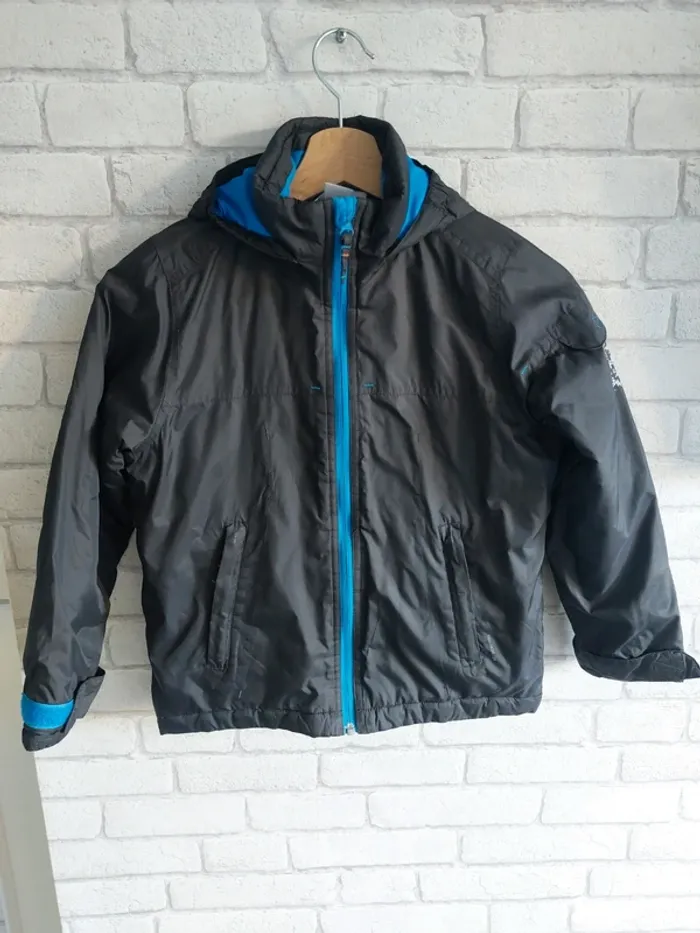 Imperméable avec capuche Oxylane taille 6
ans
