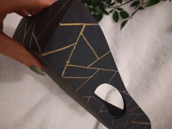 Vide poche noir et dorée