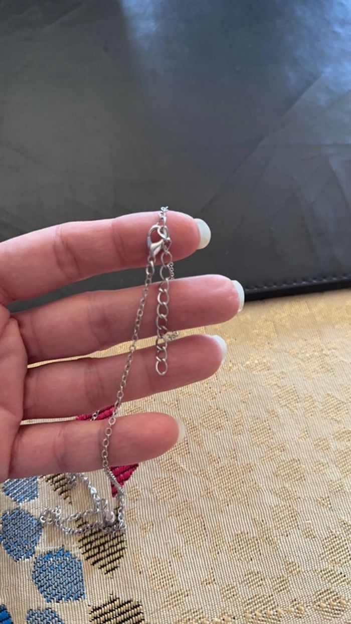 Collier avec un pendentif en brillant - photo numéro 3