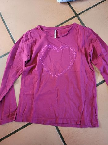 T shirt rose fushia 10 ans excellent état