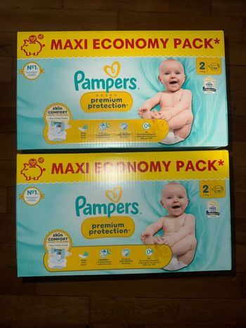 2 cartons de couches Pampers taille 2