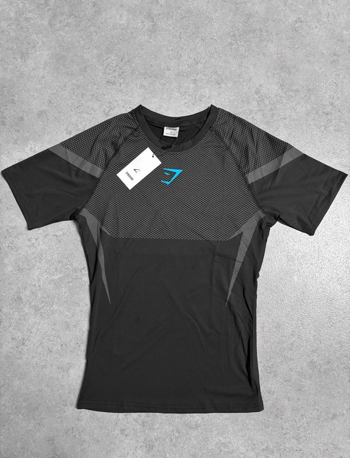 T shirt haut compression manche courte Gymshark Onyx V5 taille S bleu et noir