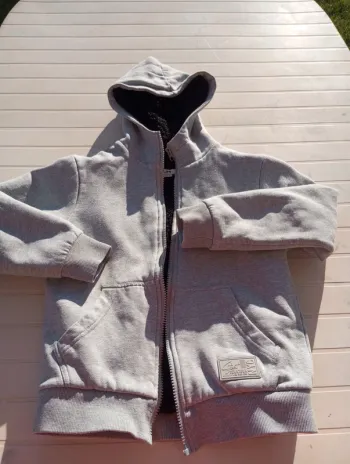 Veste à capuche épaisse de marque LH et taille 10ans
