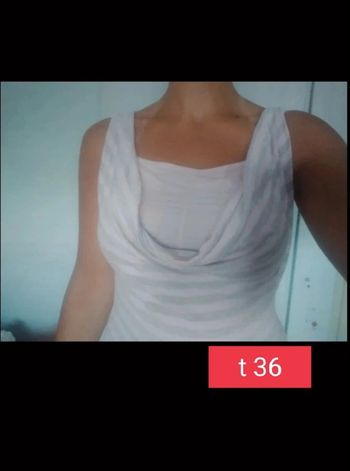 Débardeur femme . rose et argent.
Taille 36