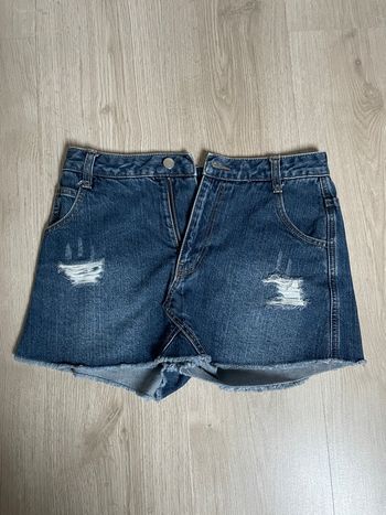 Mini jupe short en jean déchiré envym vintage