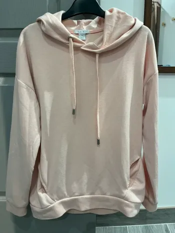 Sweat à capuche rose clair