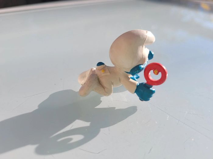 Figurines anciennes Schtroumpfs : patineur, policier, étudiant, bébé S. avec hochet - photo numéro 18