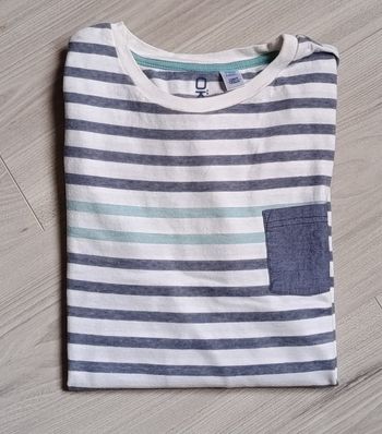 Tee-shirt à manches longues, rayé, dans les tons bleu marine et turquoise. Taille 12 ans (152 cm)