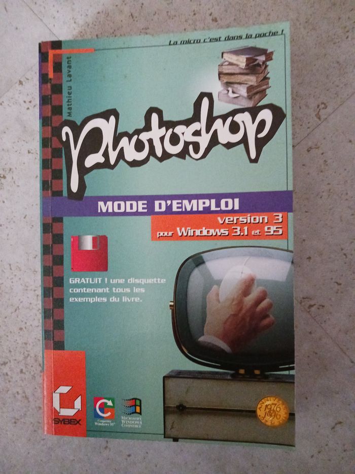 livre photoshop avec une disquette