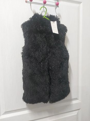 Gilet sans manche neuf avec étiquette 10 ans